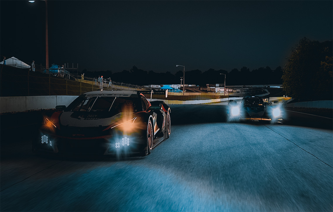SRN-Dailysportscar.com Team Corvette GT3 battling being passed by a Prototype car at night.